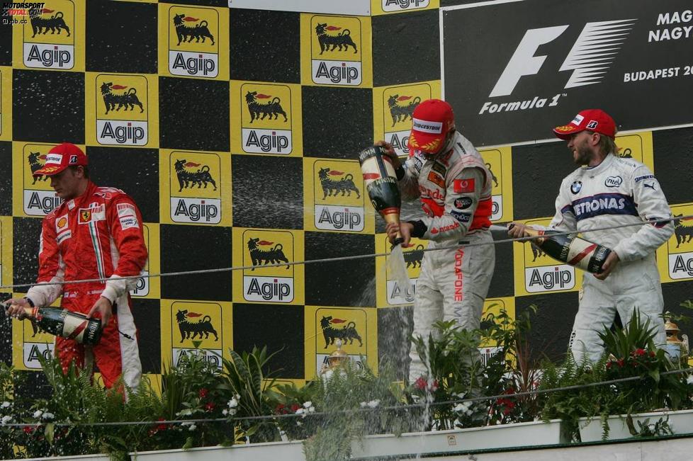 Kimi Räikkönen (Ferrari), Lewis Hamilton (McLaren-Mercedes) und Nick Heidfeld (BMW Sauber F1 Team) 