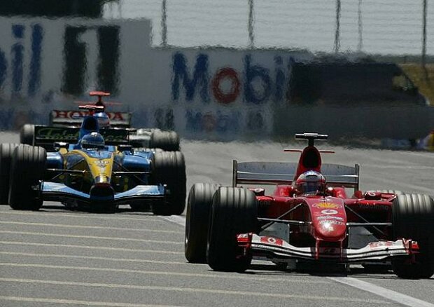 Titel-Bild zur News: Rubens Barrichello vor Jarno Trulli