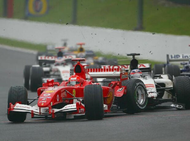 Michael Schumacher und Takuma Sato