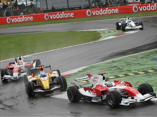 Titel-Bild zur News: Jarno Trulli, Fernando Alonso und Timo Glock