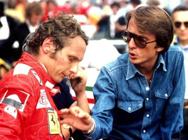 Ferrari-Fahrer Niki Lauda mit Teammanager Luca di Montezemolo